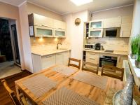 Kuchyňa alebo kuchynka v ubytovaní Markowe Apartamenty Złoty Park