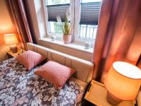 Posteľ alebo postele v izbe v ubytovaní Markowe Apartamenty Złoty Park