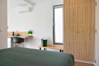 Postel nebo postele na pokoji v ubytování Flamboyant Boutique B&B