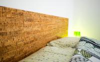 Postel nebo postele na pokoji v ubytování Flamboyant Boutique B&B