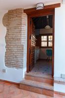 Posteľ alebo postele v izbe v ubytovaní SUITES CASA DE LAS COLUMNAS