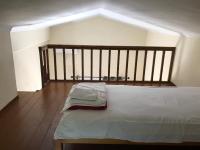 Posteľ alebo postele v izbe v ubytovaní Studio with loft Raxes Ikaria #5