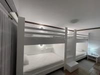 A bed or beds in a room at Sarwnisland