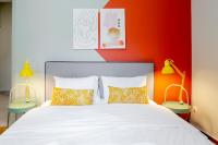 Posteľ alebo postele v izbe v ubytovaní Acropolis Apartments