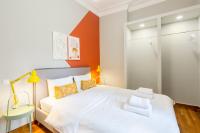 Posteľ alebo postele v izbe v ubytovaní Acropolis Apartments