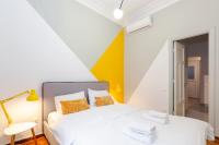 Posteľ alebo postele v izbe v ubytovaní Acropolis Apartments