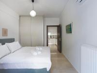 Posteľ alebo postele v izbe v ubytovaní Newly Renovated Apartment in the Heart of Athens