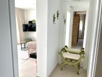 A television and/or entertainment centre at Jávea Apartment Terra