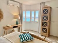 A bed or beds in a room at Jávea Apartment Terra