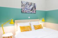 Posteľ alebo postele v izbe v ubytovaní Acropolis Apartments