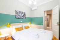Posteľ alebo postele v izbe v ubytovaní Acropolis Apartments