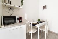 Kuchyňa alebo kuchynka v ubytovaní Piazza Tripoli bright apartment