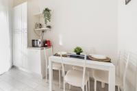 Kuchyňa alebo kuchynka v ubytovaní Piazza Tripoli bright apartment