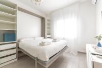 Posteľ alebo postele v izbe v ubytovaní Piazza Tripoli bright apartment