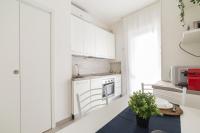 Kuchyňa alebo kuchynka v ubytovaní Piazza Tripoli bright apartment