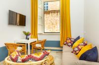 Televízia a/alebo spoločenská miestnosť v ubytovaní Kenova apartment Old Town