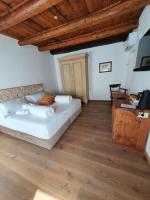 Posteľ alebo postele v izbe v ubytovaní Casa Castagna 1620