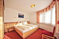 Łóżko lub łóżka w pokoju w obiekcie Appartements Plattlerhof