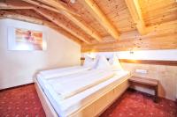 Łóżko lub łóżka w pokoju w obiekcie Appartements Plattlerhof