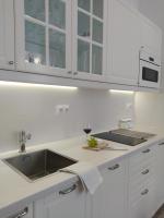 Kuchyňa alebo kuchynka v ubytovaní Apartament FANABERIA Lądek Zdrój
