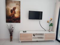 TV a/nebo společenská místnost v ubytování Apartamento En la Cala de Finestrat