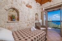 Posteľ alebo postele v izbe v ubytovaní Strofilia Authentic Villas