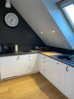 Kuchyňa alebo kuchynka v ubytovaní Przy Monciaku - Monte Cassino by OneApartments