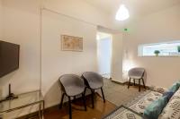 Televízia a/alebo spoločenská miestnosť v ubytovaní Charming apartment in the heart of Plaka