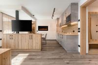 A kitchen or kitchenette at Apartments Pragser Wildsee Winklwiese