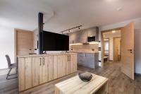 A kitchen or kitchenette at Apartments Pragser Wildsee Winklwiese