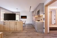 A kitchen or kitchenette at Apartments Pragser Wildsee Winklwiese