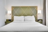Cama ou camas em um quarto em Hotel B Square