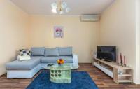 Televízia a/alebo spoločenská miestnosť v ubytovaní Apartment Liam