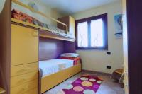 Łóżko lub łóżka w pokoju w obiekcie Villa Janas con piscina privata Budoni