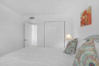 Ein Bett oder Betten in einem Zimmer der Unterkunft Beachy Keen