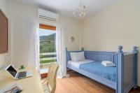Posteľ alebo postele v izbe v ubytovaní SUN VILLA GLYFADA