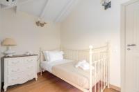 Posteľ alebo postele v izbe v ubytovaní SUN VILLA GLYFADA