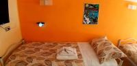 A bed or beds in a room at Vacanze Napoletane