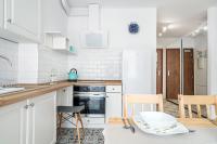 Kuchyňa alebo kuchynka v ubytovaní APARTAMENT RODZINNY