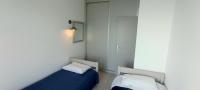 Posteľ alebo postele v izbe v ubytovaní Atlas By Sea Apartment
