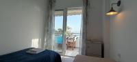 Posteľ alebo postele v izbe v ubytovaní Atlas By Sea Apartment
