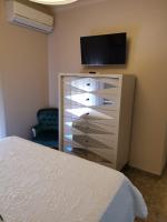 TV a/nebo společenská místnost v ubytování Apartamento Cream MRZ Rentals