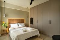 Posteľ alebo postele v izbe v ubytovaní SII City Luxury Suites