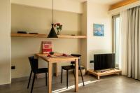 Televízia a/alebo spoločenská miestnosť v ubytovaní SII City Luxury Suites