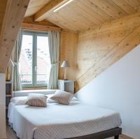 A bed or beds in a room at Turin Sweet Home