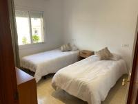 Postel nebo postele na pokoji v ubytování Casa a L’Escala, piscina comunitaria, Mallols
