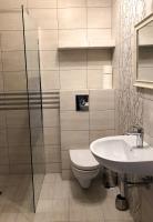Kúpeľňa v ubytovaní WIEJSKI APARTAMENT W DOMU NAD JEZIOREM