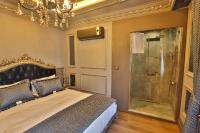 Koupelna v ubytování REAL KiNG SUiTE HOTEL
