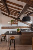 A kitchen or kitchenette at Amazing penthouse with terrace and rooftop in Trastevere