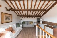 A seating area at Amazing penthouse with terrace and rooftop in Trastevere